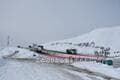 除雪あとの「巨大な雪壁」の行く末とは！？  知られざる「排雪現場」驚異の大型トラック「世界No.1“キワ攻め”テク」実見＆意外なプロセス「翌7月まで」 札幌市・雪堆積場インタビューの画像001
